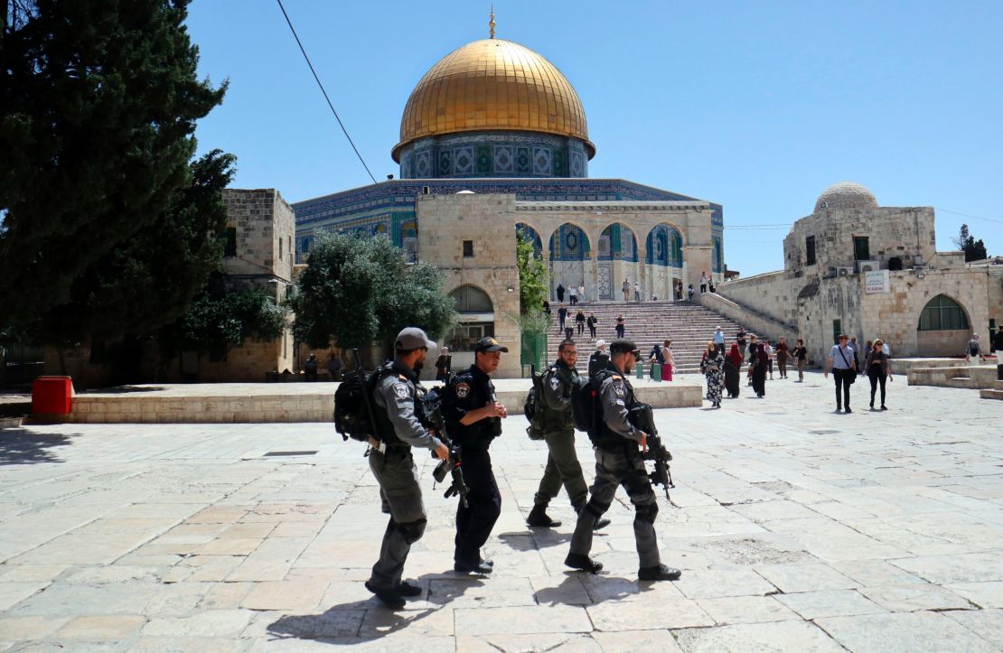 Israeli police walk past the Dome of the Rock on May 16, 2017.