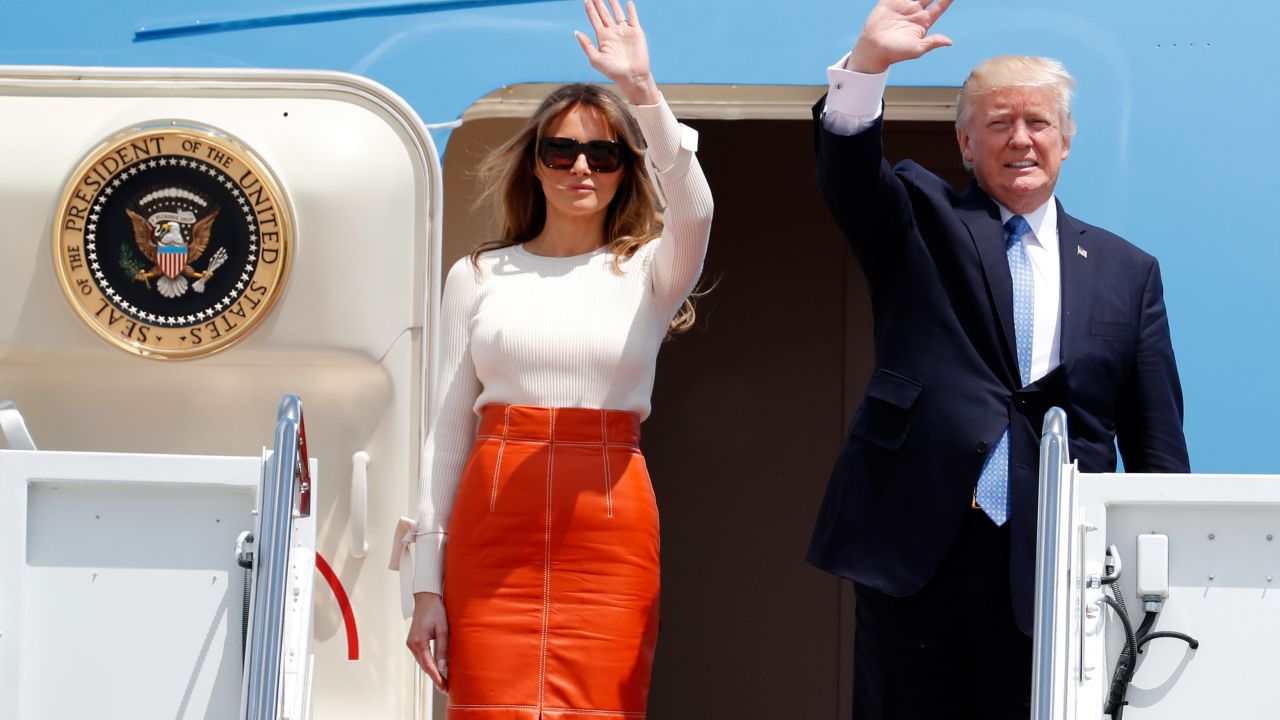 President Donald Trump and first lady Melania Trump, wave as they board Air Force One at Andrews Air Force Base, Md., Friday, May 19, 2017, prior to his departure on his first overseas trip. (AP Photo/Alex Brandon)