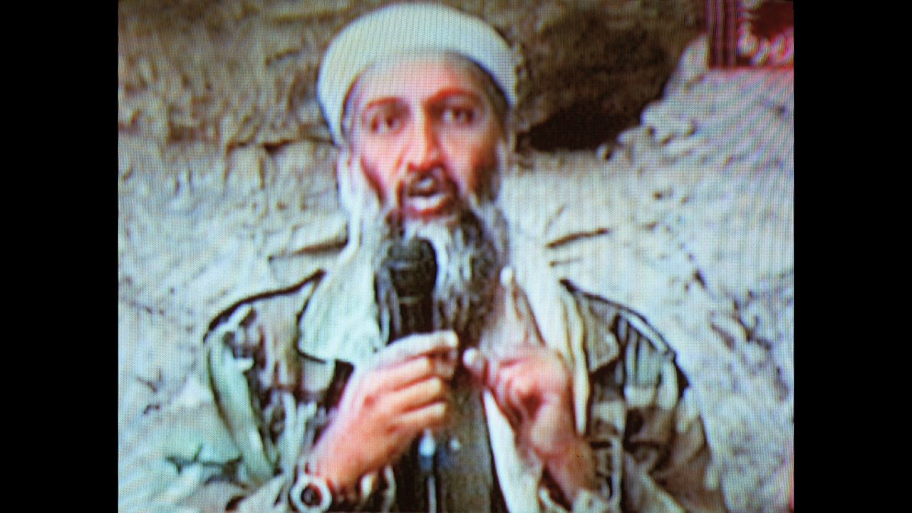 Al Qaeda leader Osama bin Laden is seen at an undisclosed location in this television image broadcast on October 7, 2001. Bin Laden praised God for the Sept. 11 attacks and swore America "will never dream of security" until "the infidel's armies leave the land of Muhammad."
