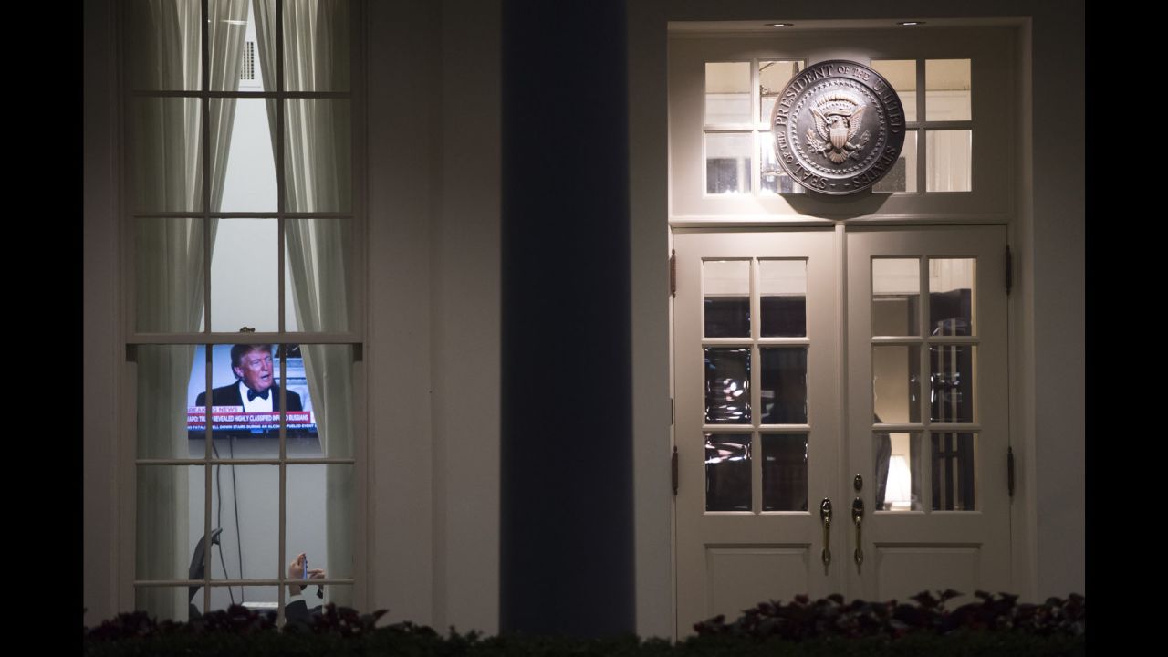 TOPSHOT - An image of US President Donald Trump appears on a television screen inside the West Wing of the White House in Washington, DC, May 15, 2017, shortly after the Washington Post reported Trump had revealed highly classified information to Russia's foreign minister and ambassador to the US during an Oval Office meeting last week.  / AFP PHOTO / SAUL LOEB        (Photo credit should read SAUL LOEB/AFP/Getty Images)