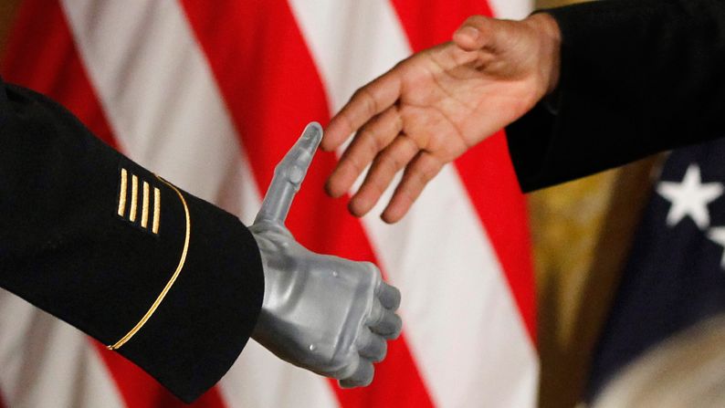 Obama shakes the prosthetic hand of Army Sgt. 1st Class Leroy Arthur Petry on July 12, 2011. Petry was at the White House to receive the Medal of Honor. The Army Ranger lost his hand while tossing an enemy grenade away from fellow soldiers in Afghanistan.