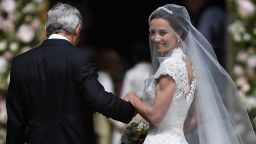 Pippa Middleton is escorted by her father Michael Middleton, as she arrives for her wedding to James Matthews at St Mark's Church in Englefield, west of London, on Saturday,  May 20.