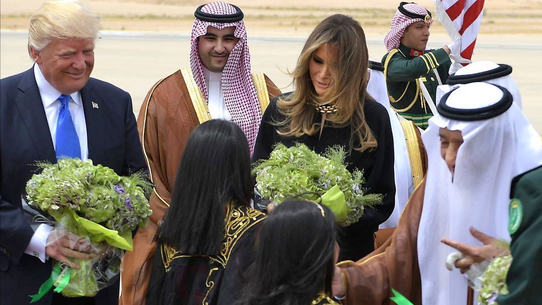 The Trumps take part in the welcome ceremony.