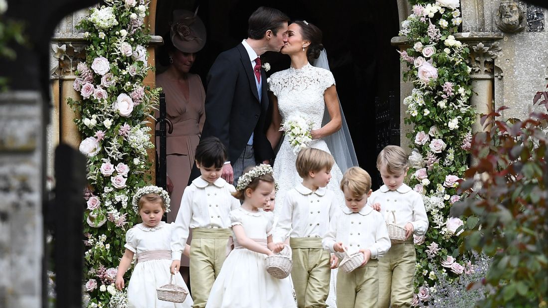 Pippa Middleton and James Matthews exit the church after their wedding ceremony at St. Mark's Church on Saturday, May 20, in Englefield, England.