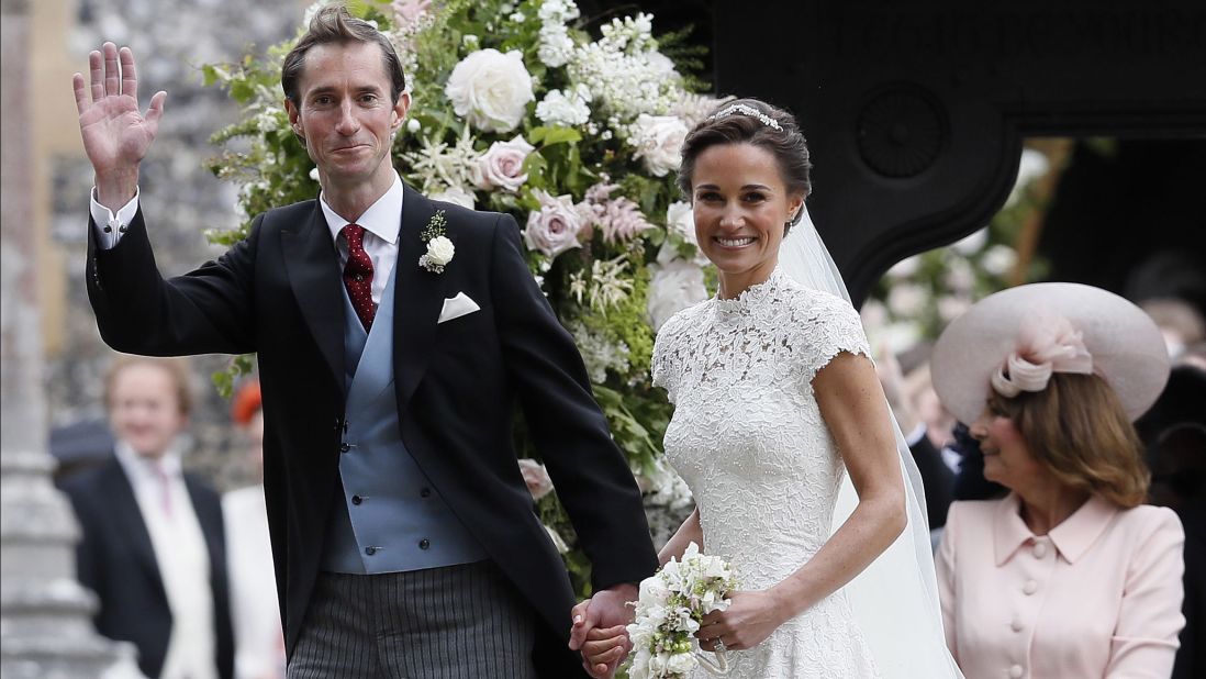 Pippa Middleton and James Matthews leave St. Mark's Church following their wedding.
