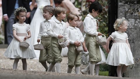 Prince George, fourth from the left, stands with other page boys and flower girls after the wedding.