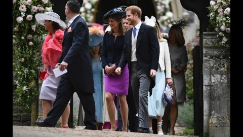 Britain's Prince Harry and other guests leave St. Mark's Church after the wedding ceremony.