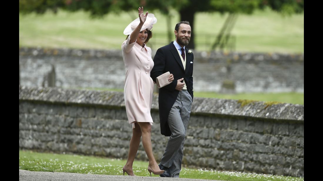 Carole Middleton and her son, James, arrive for the wedding of her daughter Pippa and James Matthews. 
