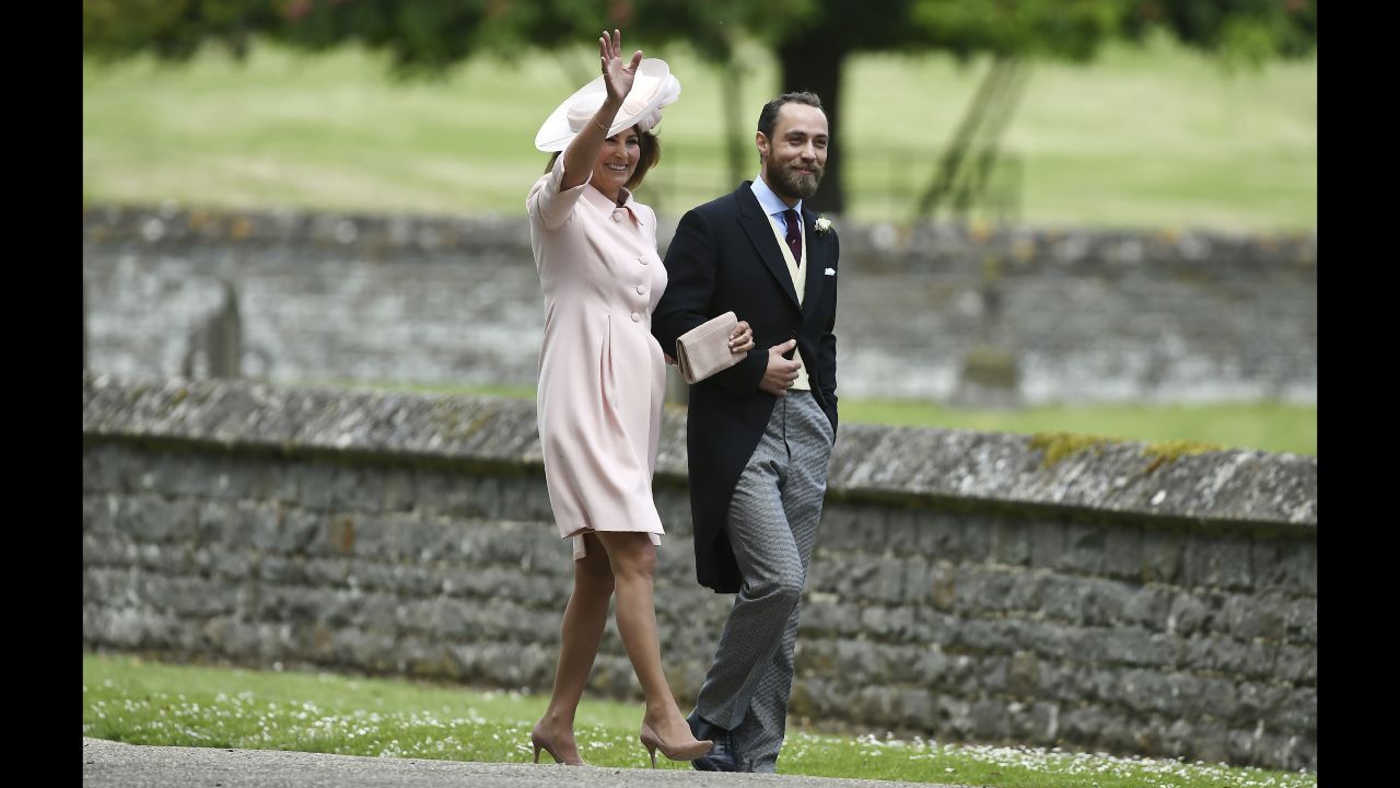 Carole Middleton and her son, James, arrive for the wedding of her daughter Pippa and James Matthews.