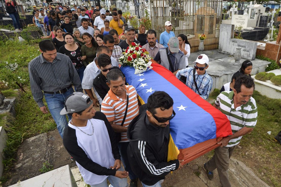 Relatives attend the funeral of Francisco Guerrero, a 15-year-old who died after he was injured May 17 during the political unrest in Venezuela's state of Tachira.