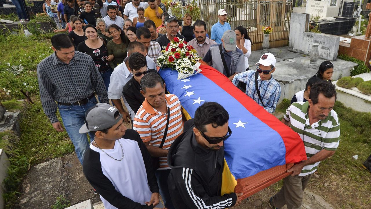 Relatives attend the funeral of Francisco Guerrero, a 15-year-old who died after he was injured May 17 during the political unrest in Venezuela's state of Tachira.