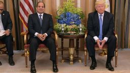 US President Donald Trump (R) and Egyptian President Abdel Fattah al-Sisi take part in a bilateral meeting at a hotel in Riyadh on May 21, 2017. / AFP PHOTO / MANDEL NGAN     