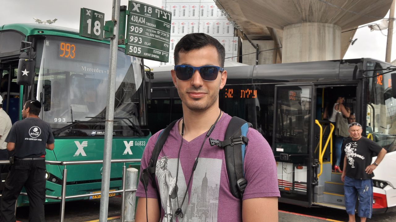 Adi, 29, at the bus station in Haifa.