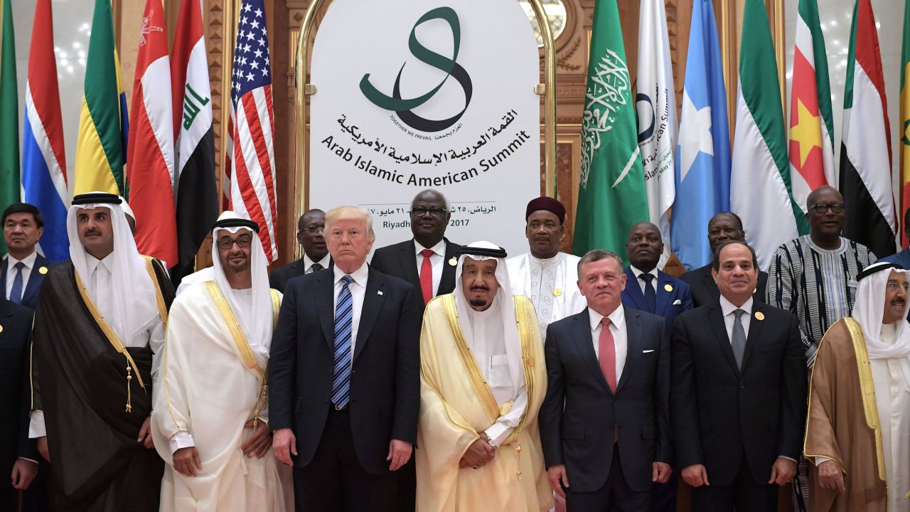 Trump poses with other leaders at the Arab Islamic American Summit.