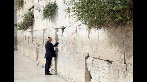 Trump touches the Western Wall, Judaism's holiest prayer site, while in Jerusalem on May 22. Trump became <a href="http://www.cnn.com/2017/05/22/politics/trump-israel-western-wall/" target="_blank">the first sitting US president to visit the wall.</a>