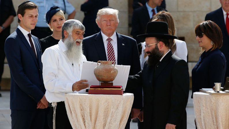 Trump stands in the Western Wall plaza. To his left, in black, is Shmuel Rabinowitz, the rabbi of the Western Wall.