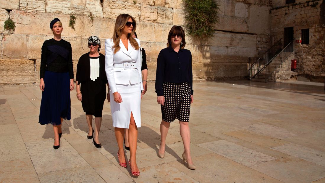 First lady Melania Trump, in white, visits the Western Wall. At far left is Ivanka Trump.