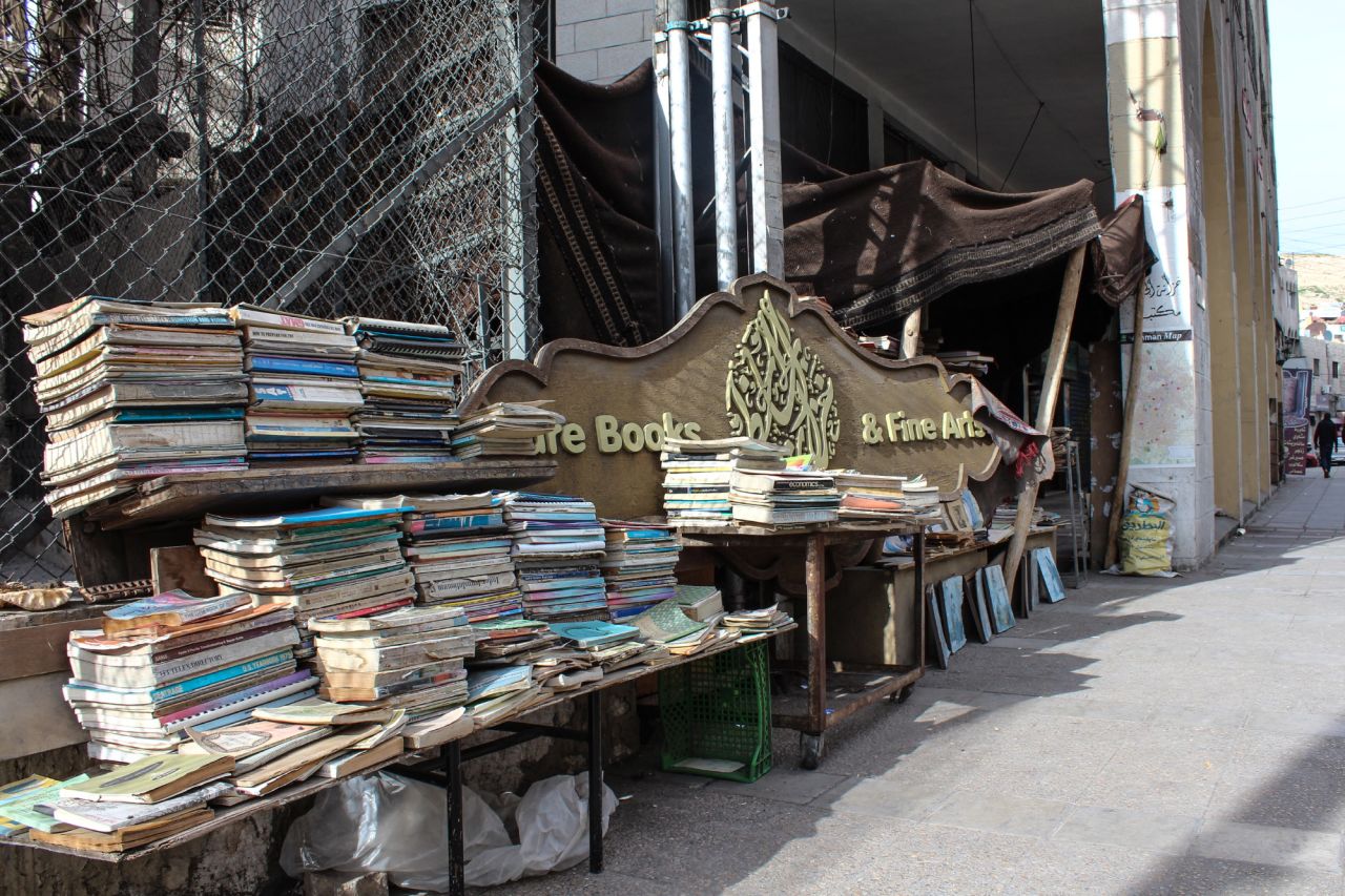 At AlMaaytah's shop, the bulk of his stock is laid out on the sidewalk. Other tomes are sheltered by a Bedouin tent, while an extremely cosy indoor area houses the rest of the books.