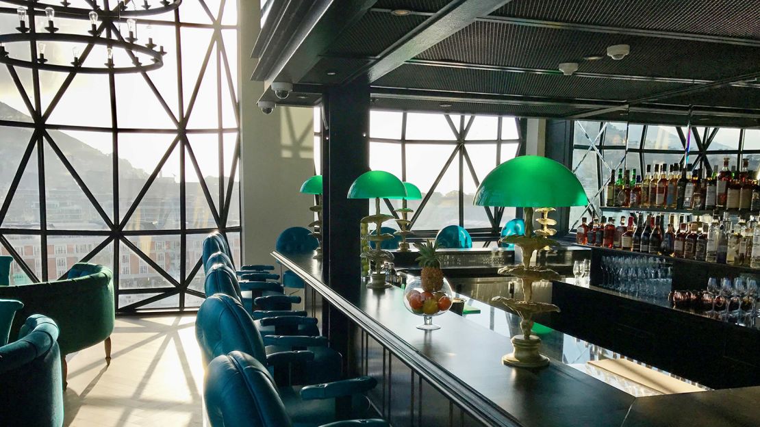 The Willaston Bar features velvety jewel-toned booths with views of Cape Town's iconic Table Mountain.