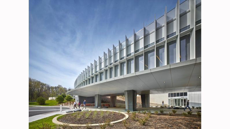 Perkins+Will transformed a 1980s office building into a state-of-the-art cancer facility. The firm added a courtyard to give each of the 18 infusion rooms a view of nature.
