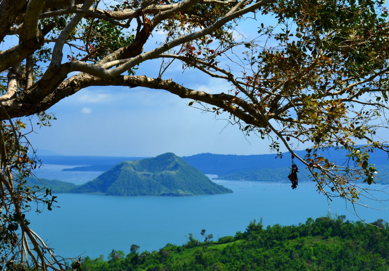 <strong>Taal Volcano: </strong>Located about 30 minutes south of Manila, Taal Volcano sits within a lake within an island, adjacent to the holiday town of Tagaytay, a popular getaway for Manila residents. The smallest volcano in the world, at just 1,020 feet tall Taal attracts thousands of tourists every year. 