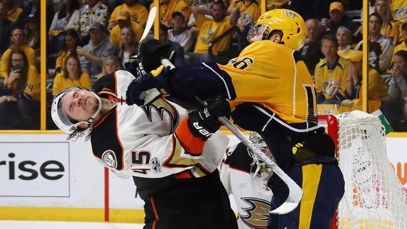 Nashville's Pontus Aberg hits Anaheim's Sami Vatanen during Game 4 of the NHL's Western Conference Final on Thursday, May 18.