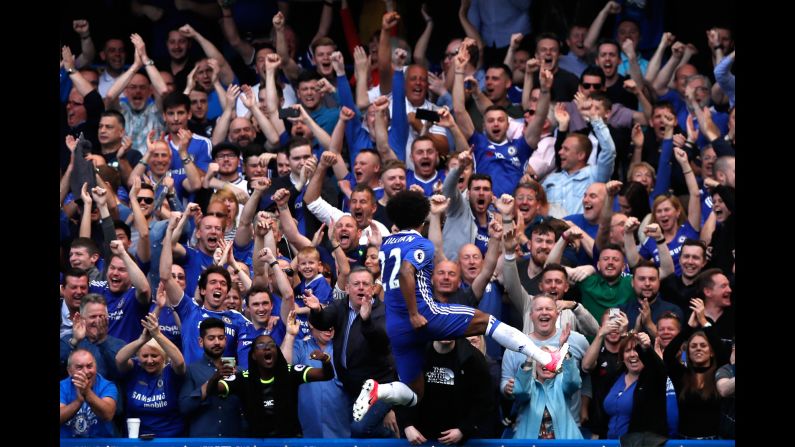 Chelsea fans celebrate with Willian after the Brazilian scored a goal during a Premier League match in London on Sunday, May 21. The Blues ripped Sunderland 5-1 in what was the final match of <a href="index.php?page=&url=http%3A%2F%2Fwww.cnn.com%2F2017%2F05%2F12%2Ffootball%2Fantonio-conte-chelsea-premier-league-title-winners-west-brom-batshuayi%2F" target="_blank">their league-winning season.</a> Chelsea could also win the FA Cup later this month.