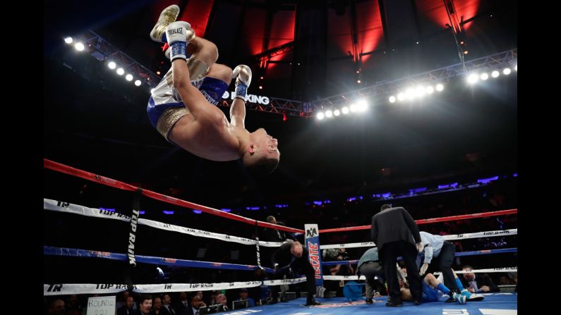 Teofimo Lopez celebrates after knocking out Ronald Rivas in the second round of their lightweight bout in New York on Saturday, May 20.