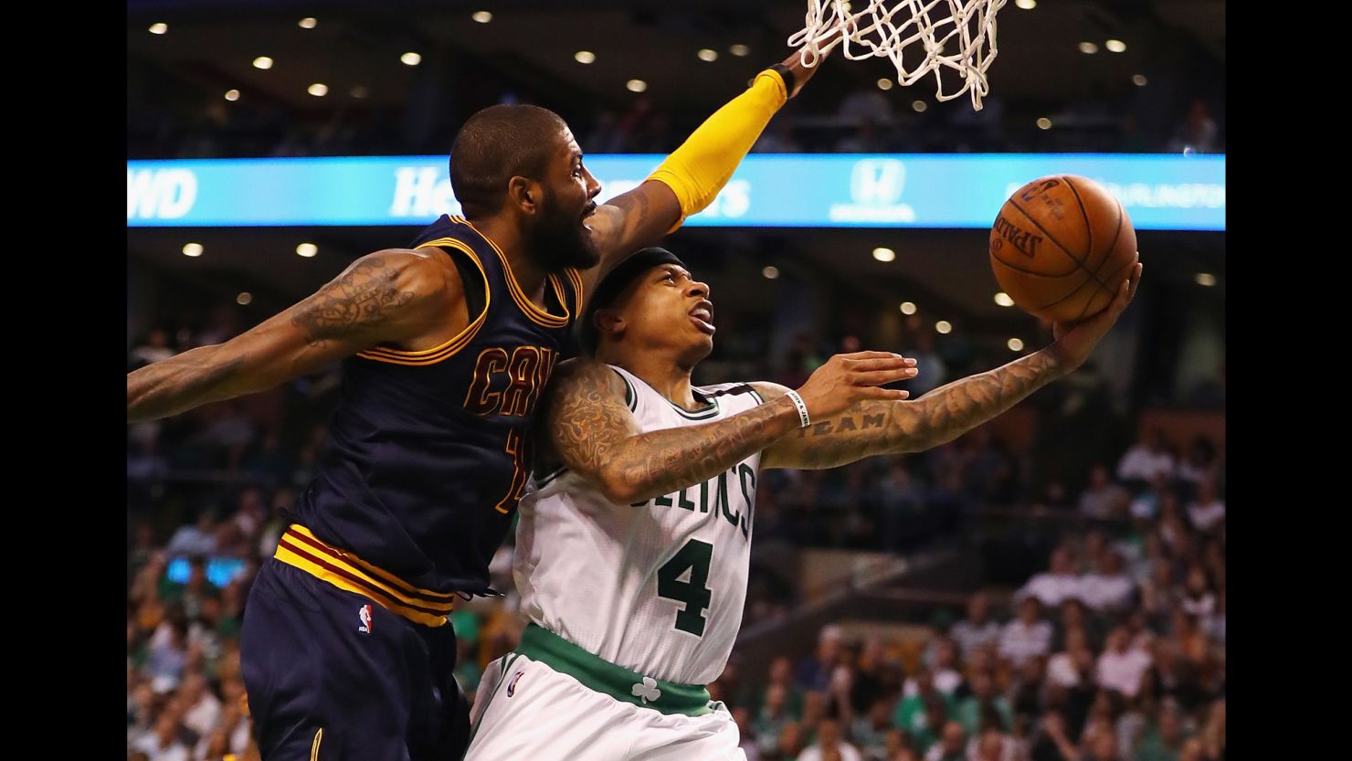 The Boston Celtics traded Isaiah Thomas, right, to the Cleveland Cavaliers for Kyrie Irving, left.