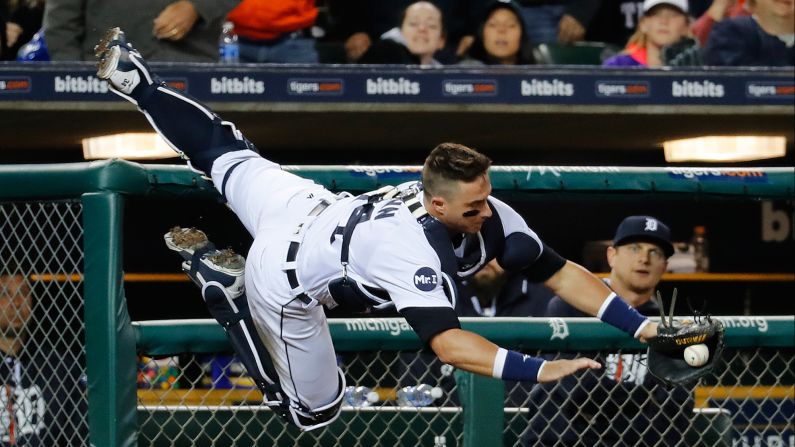 Detroit's James McCann dives for a foul ball during a Major League Baseball game against Texas on Saturday, May 20.