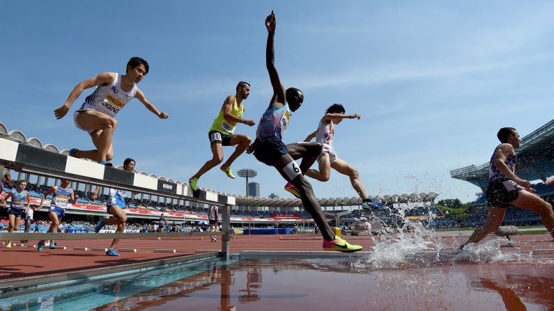 Athletes compete in the 3,000-meter steeplechase at the Golden Grand Prix, a track meet in Kawasaki, Japan, on Sunday, May 21.