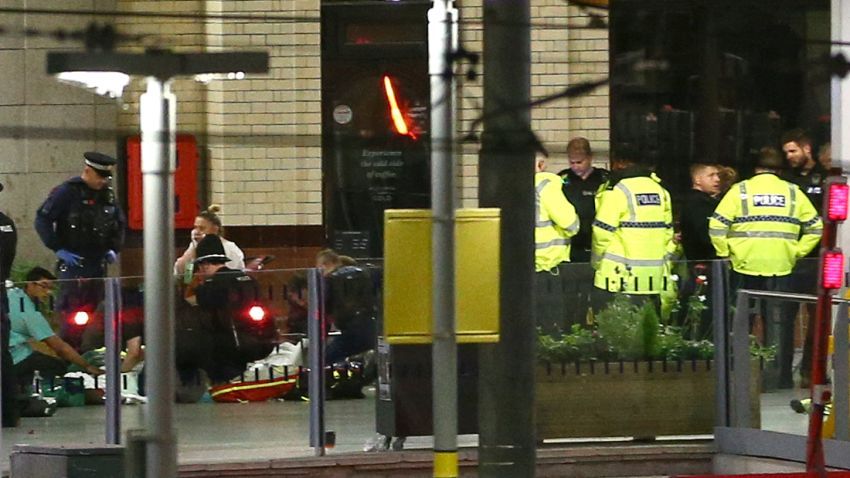 MANCHESTER, ENGLAND - Members of the public receive treatment from emergency service staff at Victoria Railway Station close to the Manchester Arena on May 23, 2017 in Manchester, England.  There have been reports of explosions at Manchester Arena where Ariana Grande had performed this evening.  Greater Manchester Police have have confirmed there are fatalities and warned people to stay away from the area. (Photo by Dave Thompson/Getty Images)