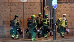Medics deploy at the scene of a reported explosion during a concert in Manchester, England on May 23, 2017. 
British police said early May 23 there were "a number of confirmed fatalities" after reports of at least one explosion during a pop concert by US singer Ariana Grande. Ambulances were seen rushing to the Manchester Arena venue and police added in a statement that people should avoid the area
 / AFP PHOTO / Paul ELLIS        (Photo credit should read PAUL ELLIS/AFP/Getty Images)