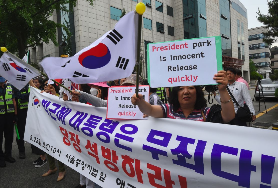 Supporters of South Korea's ousted president Park Geun-Hye gather outside the Seoul Central District Court in Seoul on May 23, 2017 before Park's arrival at the court.