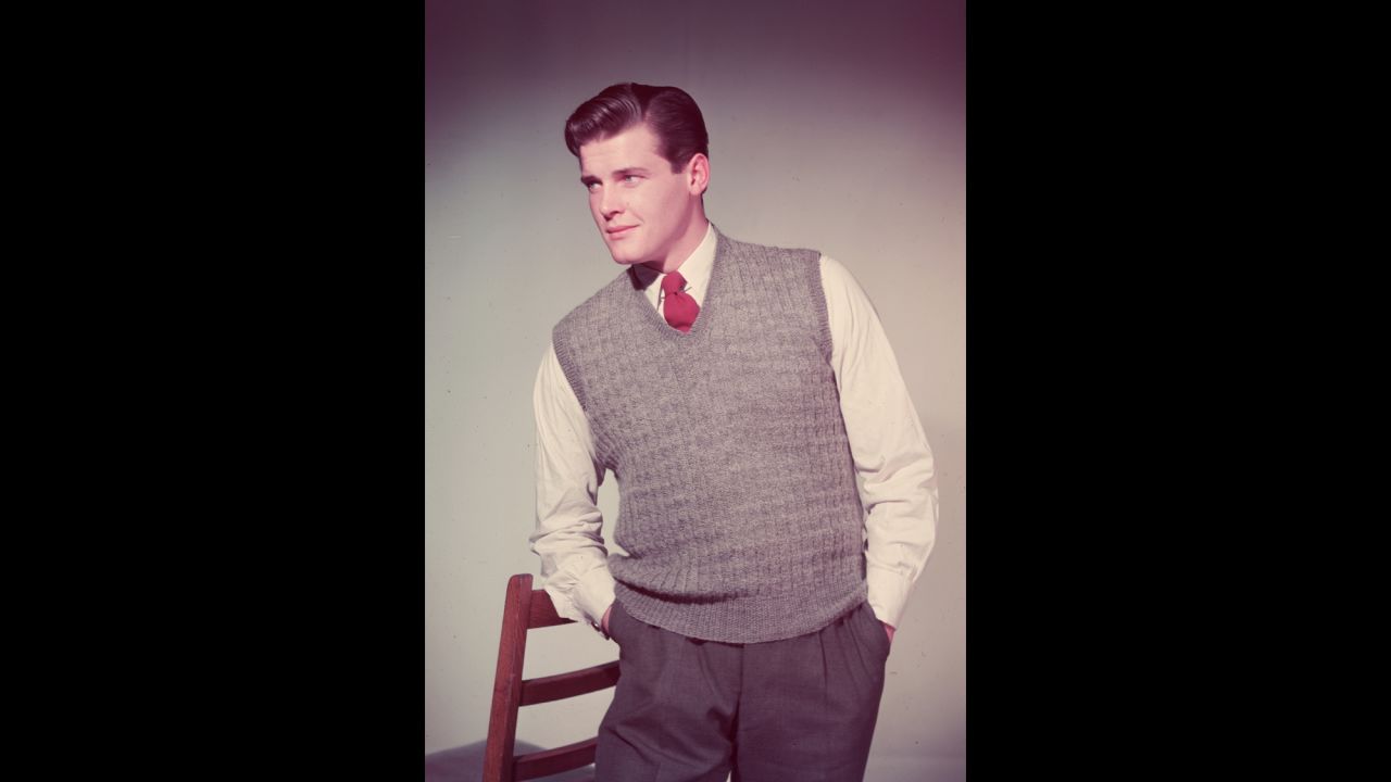 Moore wears a sweater in his modeling days, before he found fame in his acting career.