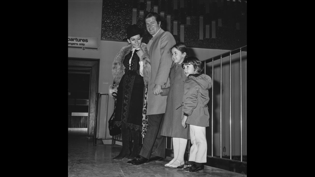 Moore and Mattioli are accompanied by their children at London Airport in 1971. Moore had three children, all with Mattioli.