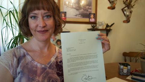 Mandy Martinson holds a letter she received from President Barack Obama.