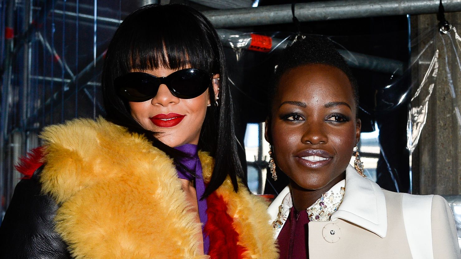  Lupita Nyong'o and singer Rihanna attend the Miu Miu show as part of the Paris Fashion Week Womenswear Fall/Winter 2014-2015 in March 2014 in Paris, France.