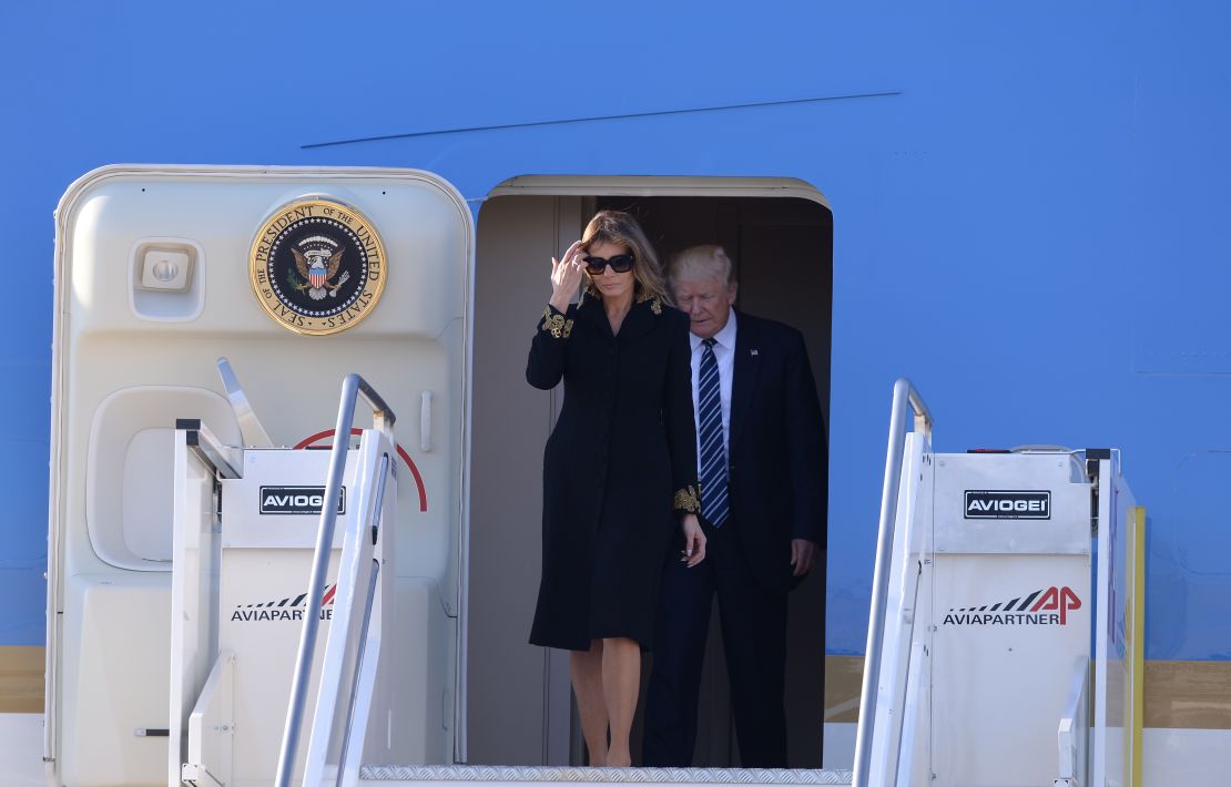 US President Donald Trump and First Lady Melania Trump step off Air Force One upon arrival at Rome's Fiumicino Airport on May 23, 2017. Donald Trump arrived in Rome for a high-profile meeting with Pope Francis in what was his first official trip to Europe since becoming US President. 