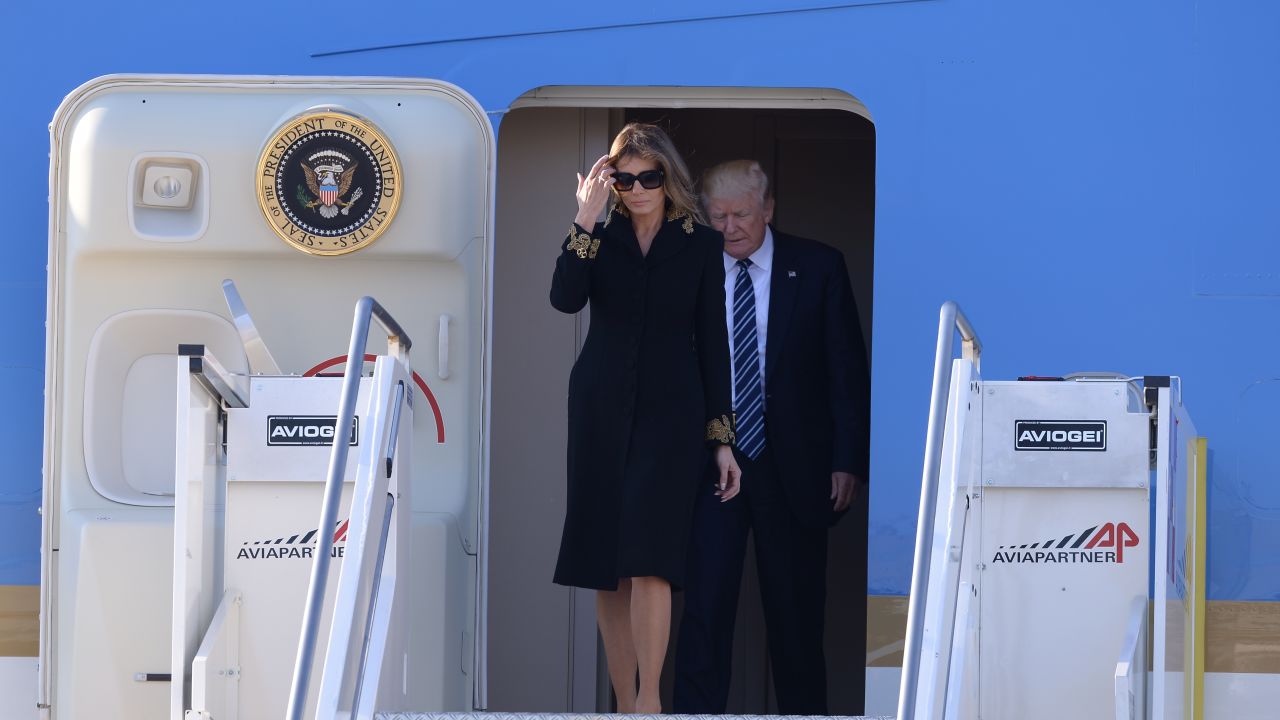 US President Donald Trump and First Lady Melania Trump step off Air Force One upon arrival at Rome's Fiumicino Airport on May 23, 2017. Donald Trump arrived in Rome for a high-profile meeting with Pope Francis in what was his first official trip to Europe since becoming US President.