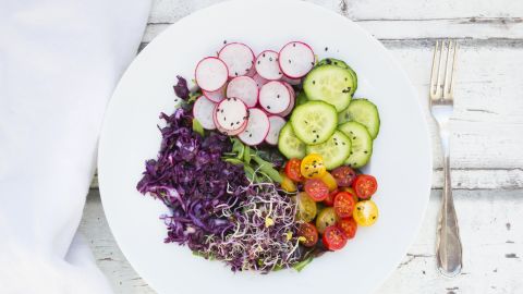 Salads promote satiety because vegetables such as lettuce, tomatoes and cucumbers have a high water content. 