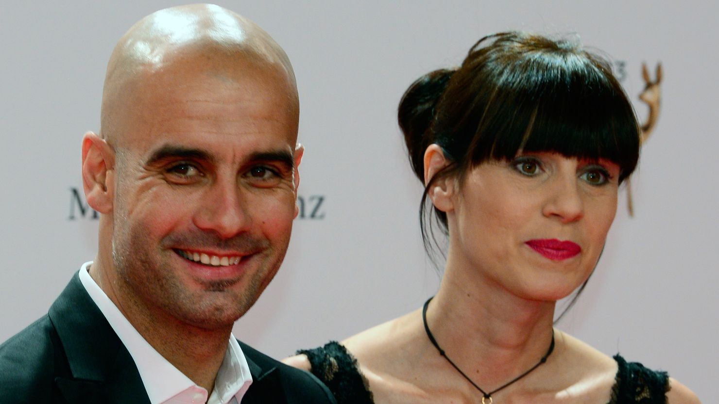 Guardiola is pictured with his wife Christina.