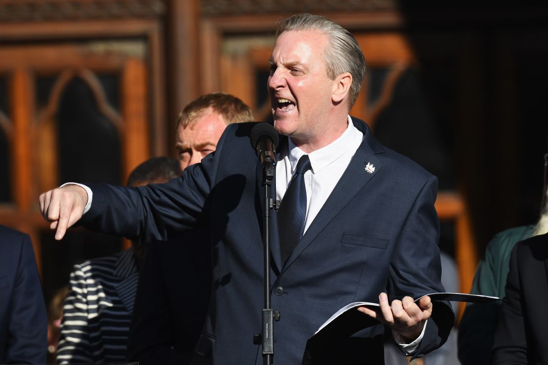Poet Tony Walsh speaks at a vigil, to honor the victims of Monday evening's terror attack on a concert in Manchester.