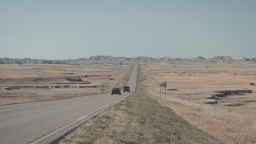 A road leading out of the Pine Ridge Indian Reservation in South Dakota.