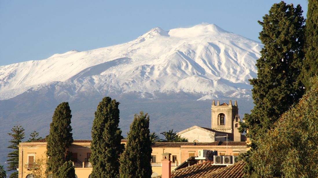 <strong>Mount Etna, Sicily: </strong>Mount Etna towers over the cities of Messina and Catania in the far east of Sicily and is the highest active volcano in Europe. At 3,329 meters it is also the tallest peak in Italy south of the Alps. Because Etna is in an almost constant state of activity its fertile volcanic soils support abundant agriculture and viticulture on its lower flanks.