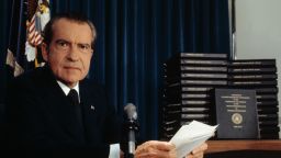 (Original Caption) President Richard Nixon said he will turn over 1,200 pages of edited transcripts about Watergate scandal to the House Judiciary Committee that, he said, would clear him of any involvement and will "tell it all". The stack of transcripts to be turned over are in the background.
