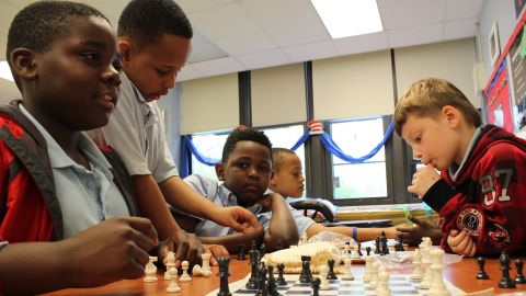 Students learn chess and boxing in the after-school program at Deneen School of Excellence.