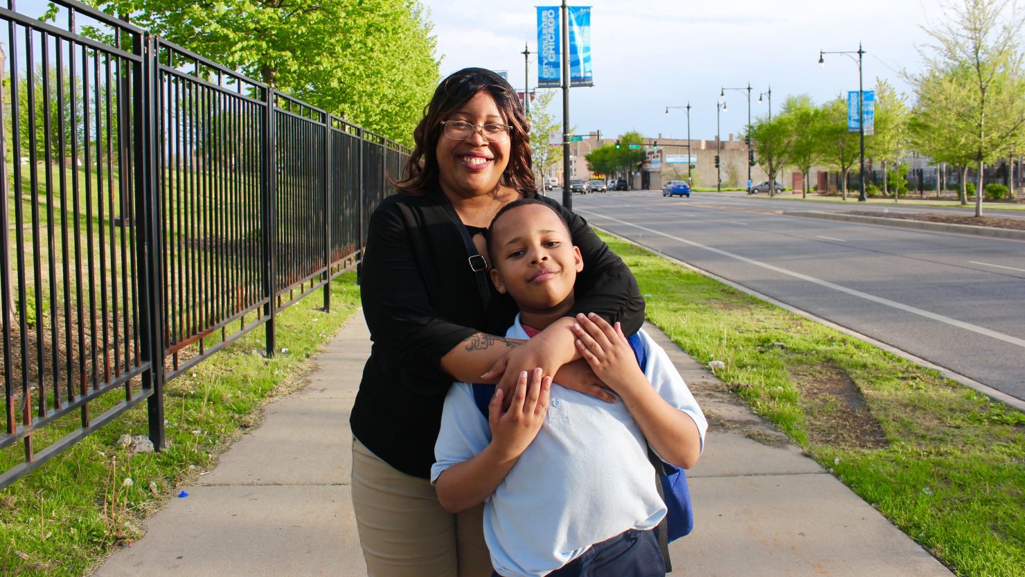 Rachel Norwood and her son, Justice Watkins, on their way home from his school.