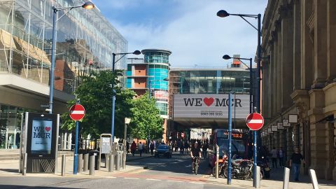 By Tuesday afternoon, many had returned to Manchester's shopping district while billboards shared messages of defiance.