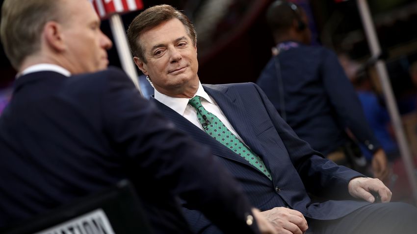CLEVELAND, OH - JULY 17:  Paul Manafort (R), campaign manager for Republican presidential candidate Donald Trump, is interviewed by journalist John Dickerson (L) on the floor of the Republican National Convention at the Quicken Loans Arena  July 17, 2016 in Cleveland, Ohio. The Republican National Convention begins tomorrow.  (Photo by Win McNamee/Getty Images)